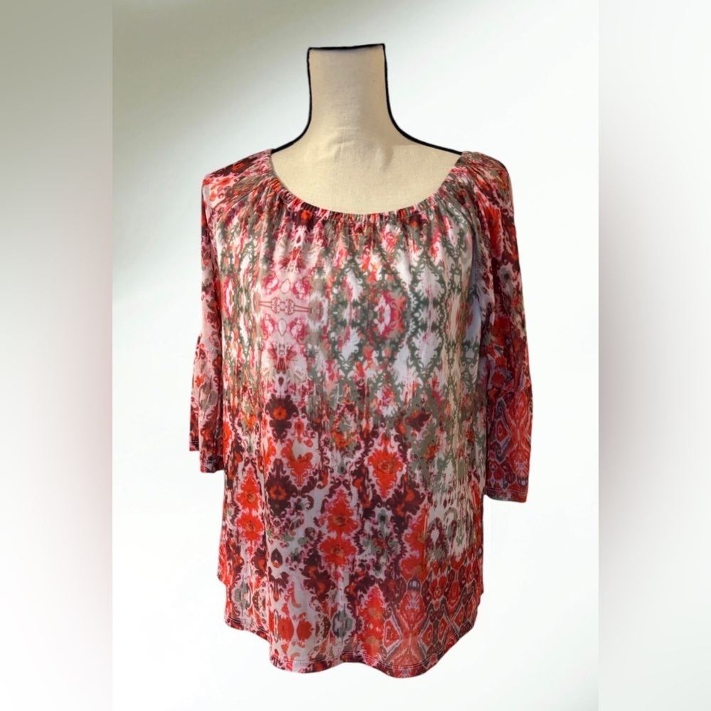 Boho-style top with sheer sleeves,no tags look at the pictures for measurements.